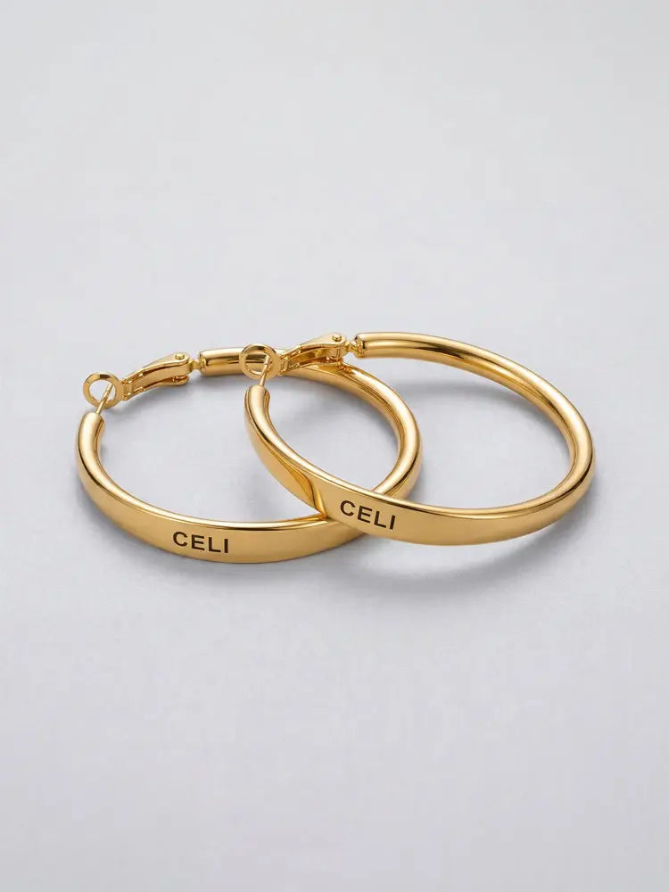 Boucles d'oreilles créoles vintage en or de Paris, grandes créoles, style ancien.