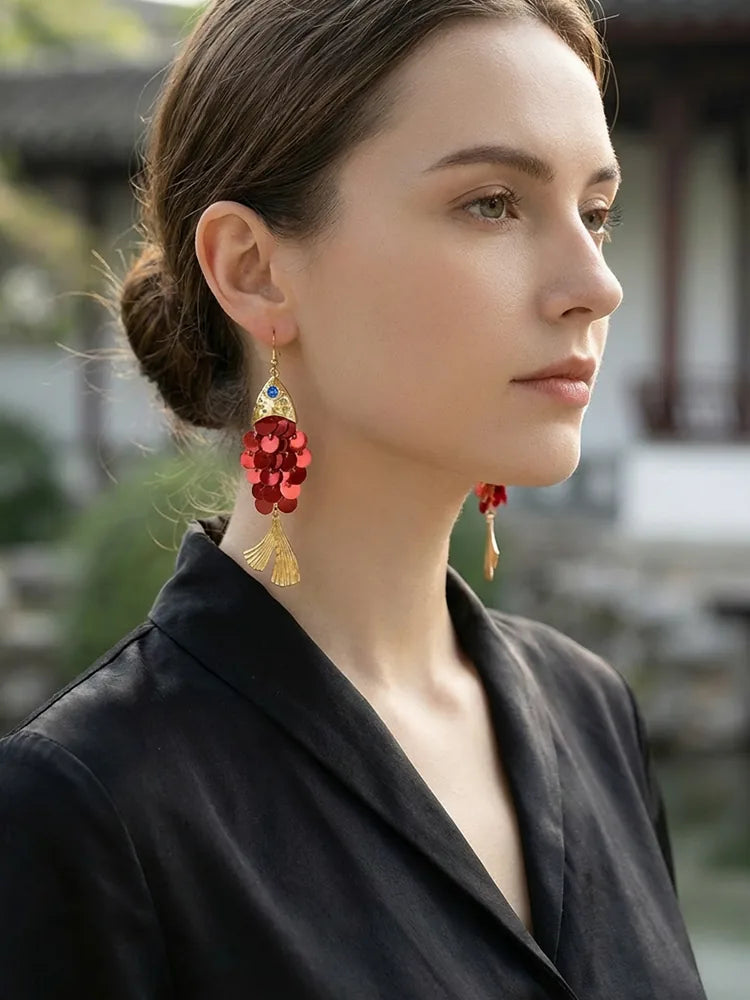 Fish-shaped shell drop earrings