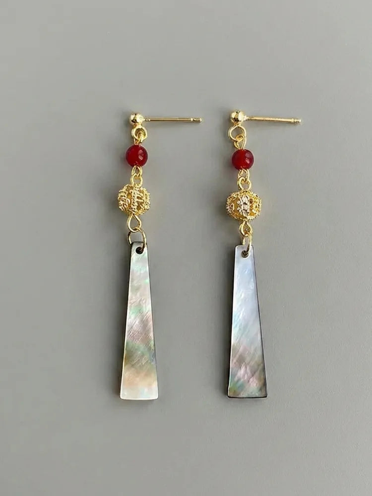 Shell travel stud earrings