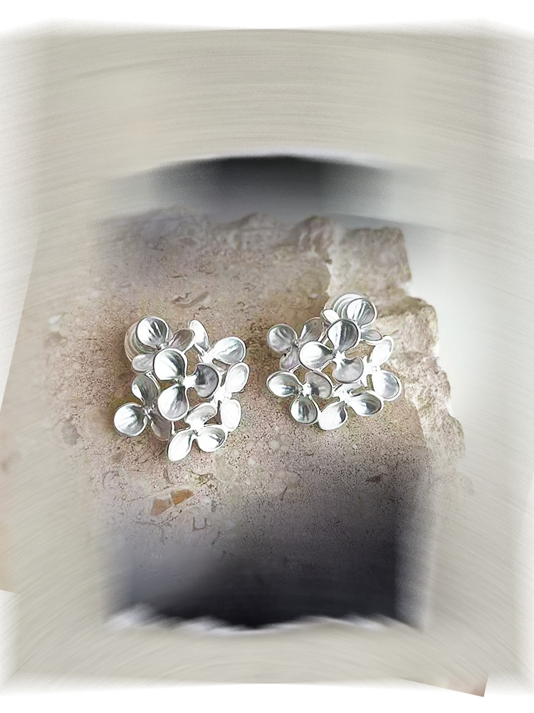 Silver Flower Clip-On Earrings