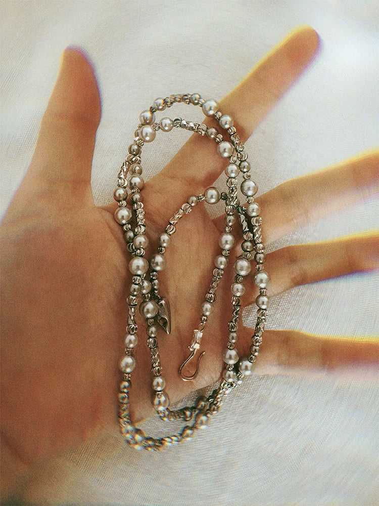 Fairies Whisper “Seaweed” silver necklace, versatile long chain for layered neck styling, marine-inspired design.