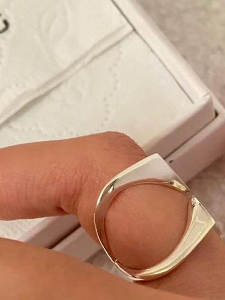 Silver Stainless Steel X-Shaped MM Ring – Product Description