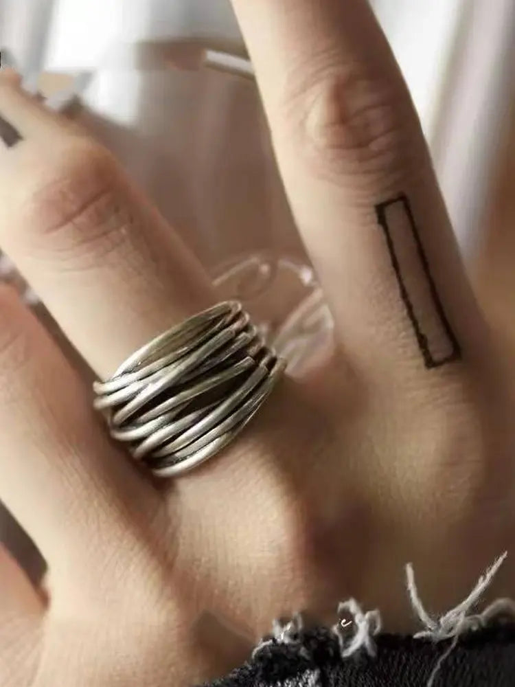 Cross-wrapped vintage multi-layer ring distressed with braided line openings