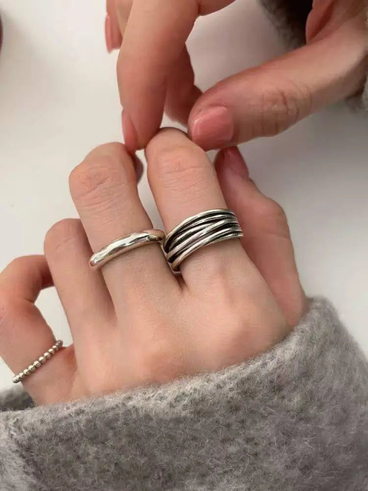 Cross-wrapped vintage multi-layer ring distressed with braided line openings