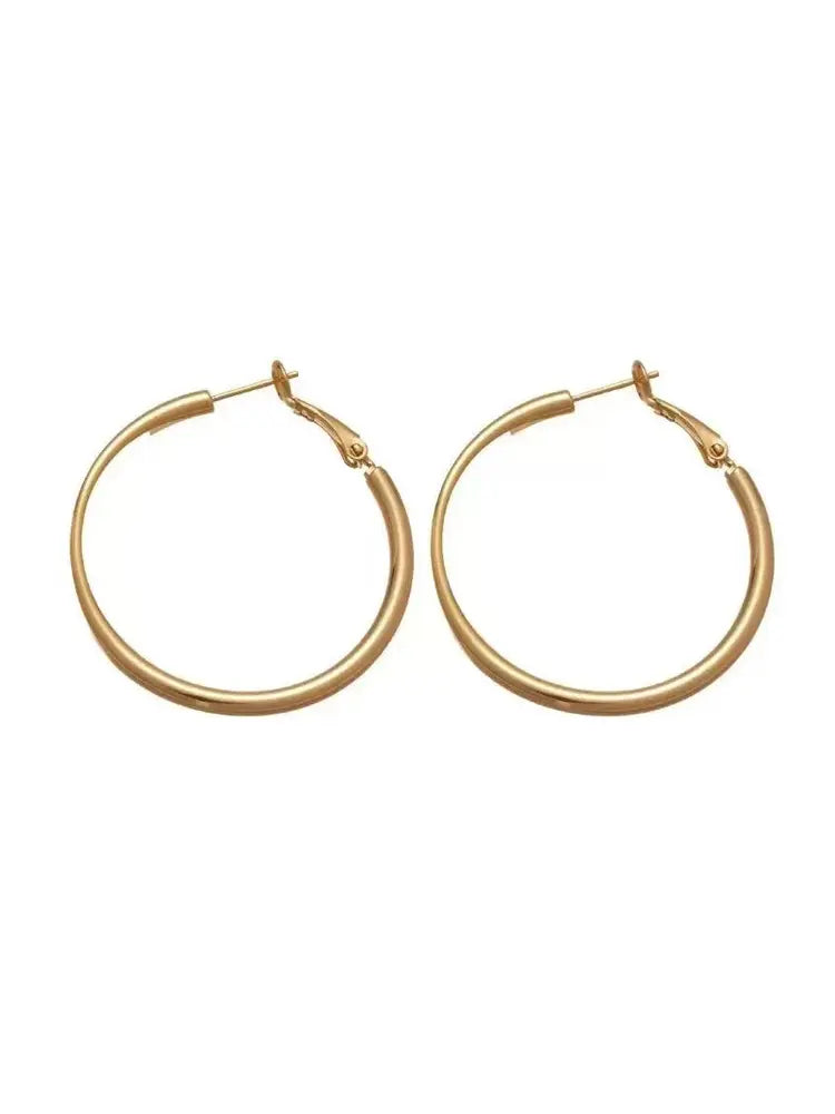 Boucles d'oreilles créoles vintage en or de Paris, grandes créoles, style ancien.