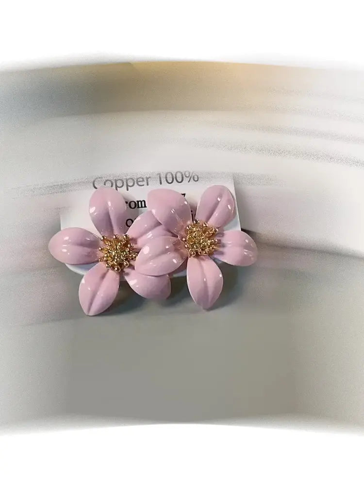 Boucles d'oreilles SS26 à motif floral émaillé, finition métallisée