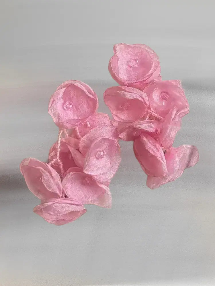 Boucles d'oreilles à clip en gaze tissée, motif étamines vibrantes