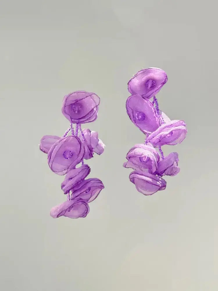 Boucles d'oreilles à clip en gaze tissée, motif étamines vibrantes