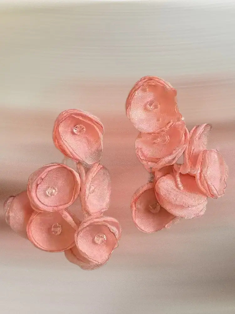 Boucles d'oreilles à clip en gaze tissée, motif étamines vibrantes