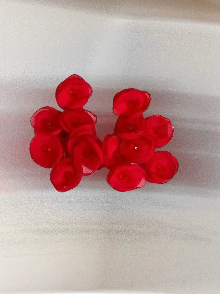 Boucles d'oreilles à clip en gaze tissée, motif étamines vibrantes