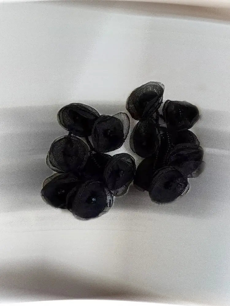 Boucles d'oreilles à clip en gaze tissée, motif étamines vibrantes