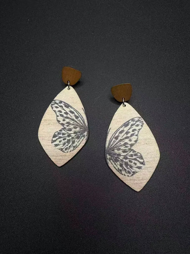 Travel butterfly textured handmade wooden earrings