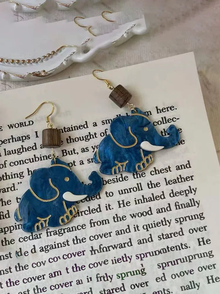 Blue elephant ear clips earrings