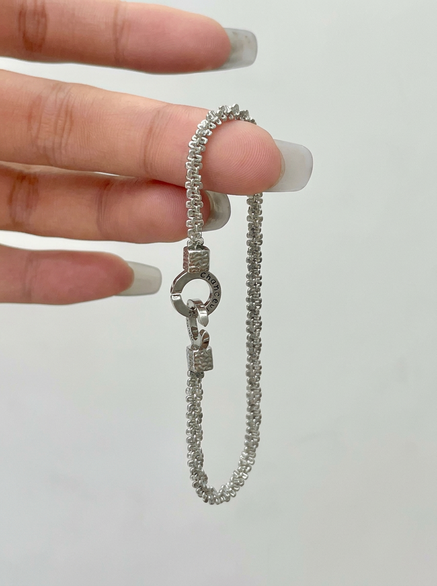 Bracelet unisexe à double anneau entrelacé