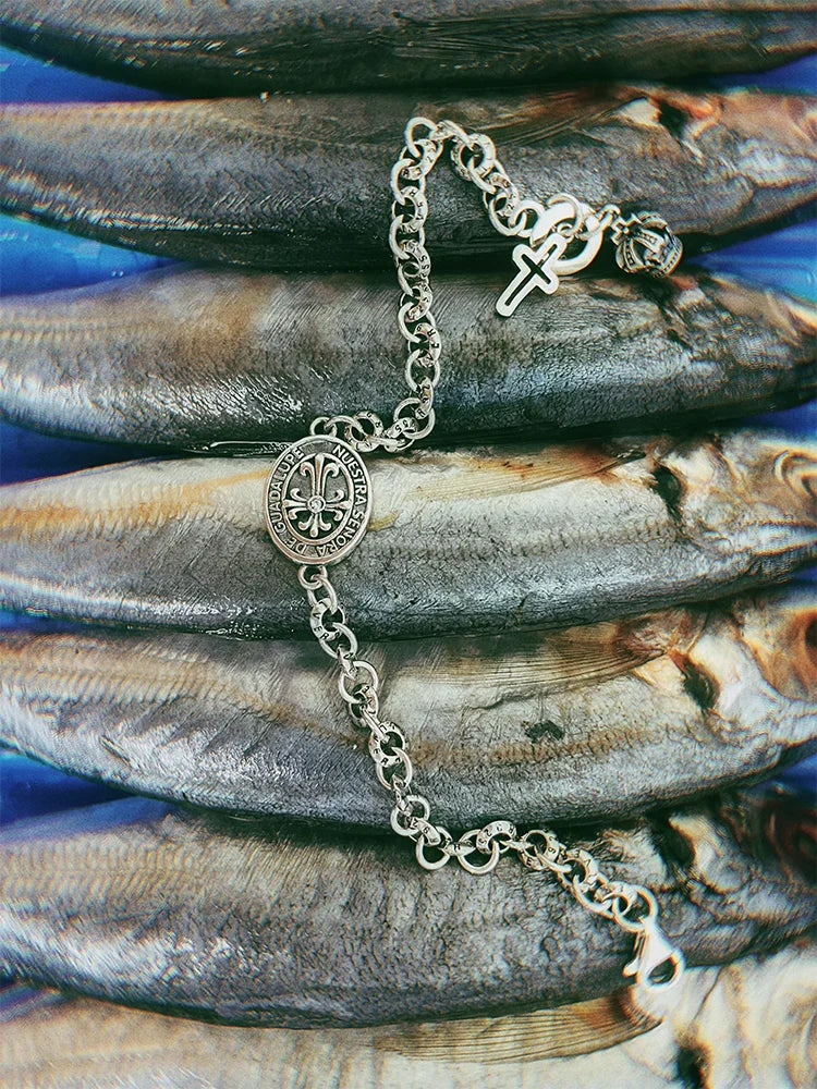 Fairies Whisper symbolic jewelry, stainless steel with sacred charm