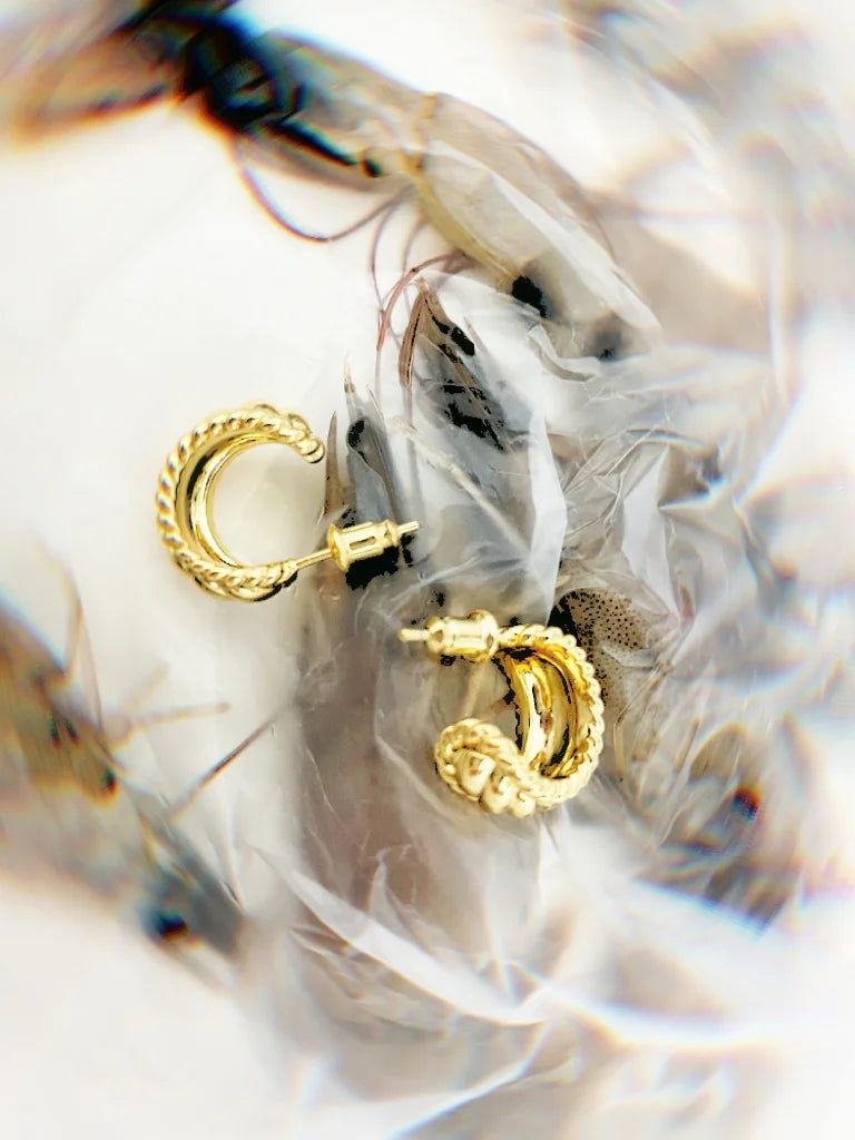 Fairies Whisper Wheat.exe Earrings side view, textured gold hoops with natural wheat-inspired design