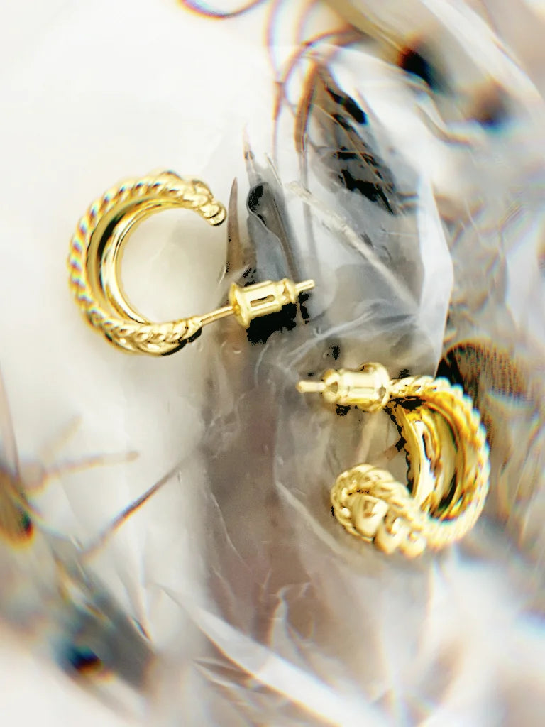 Fairies Whisper Wheat.exe Earrings close-up, delicate gold hoop earrings with wheat grain pattern