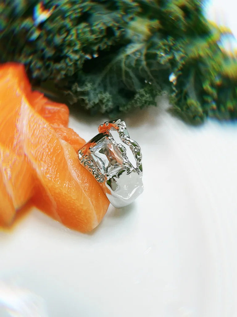 Fairies Whisper Diamond Phantom Ring close-up, silver sculptural design with synthetic diamond