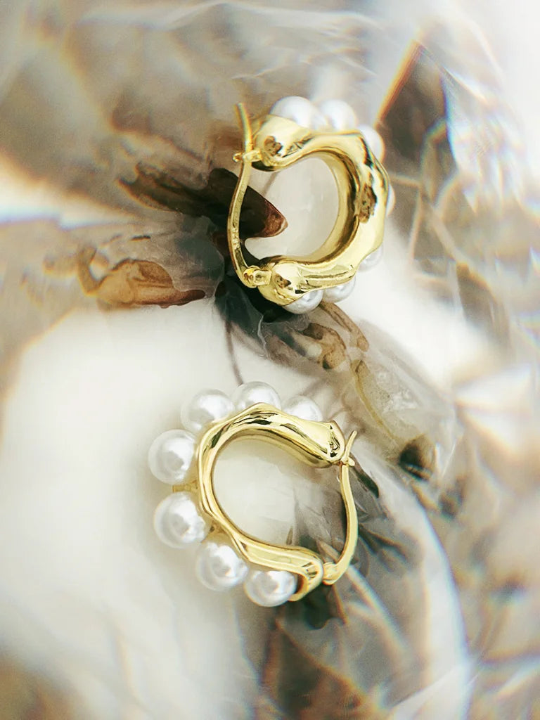 Fairies Whisper Pearl 404 Earrings close-up, gold earrings with surrounding white pearls